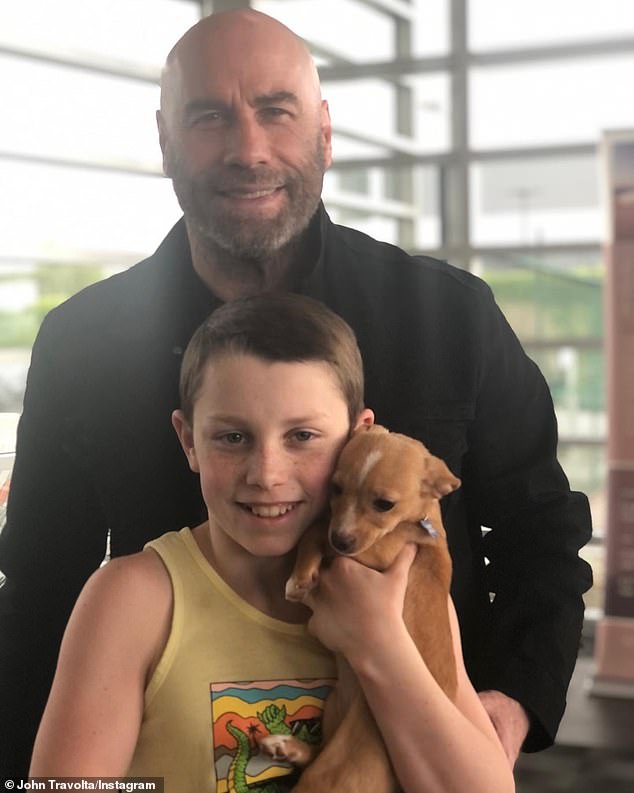John Travolta reveals that his son Ben adopted rescue pup Jimmy Lee Curtis from Betty White Oscar