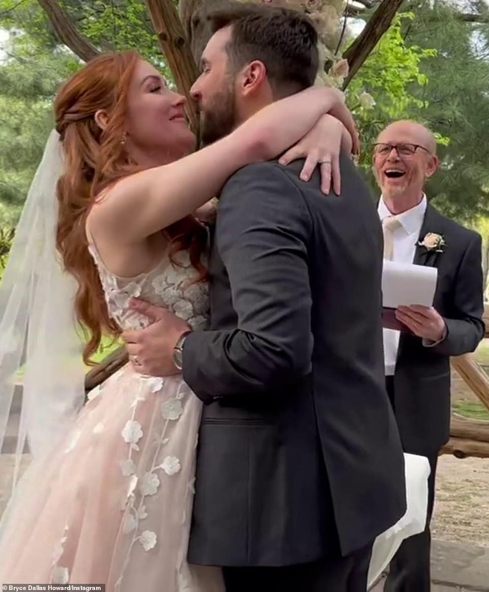 Finally at long last: In her caption, Bryce shared her congratulations to the 'newlyweds' and suggested the big day has been delayed due to the coronavirus pandemic.