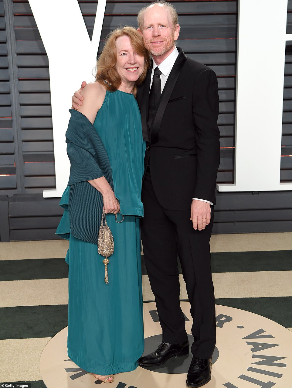 Side by side: Ron himself has been married to his wife, Sheryl Howard, mother of the bride, since 1975 when he was known as an actor rather than the star director he has since become;  Filmed in 2017 at Vanity Fair Oscar Party