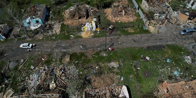 Destroyed houses in the village of Velhivka near Kharkiv, Ukraine, on Thursday, May 11.