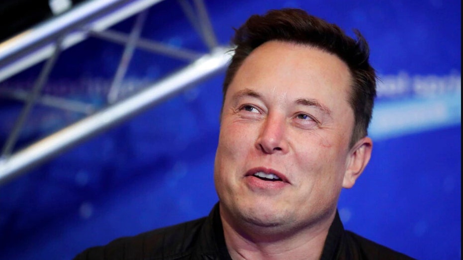 Tesla CEO Elon Musk arrives at the Axel Springer Media Award in Berlin