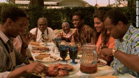 scene from "  Mississippi Masala "  Show the family having a meal together. 