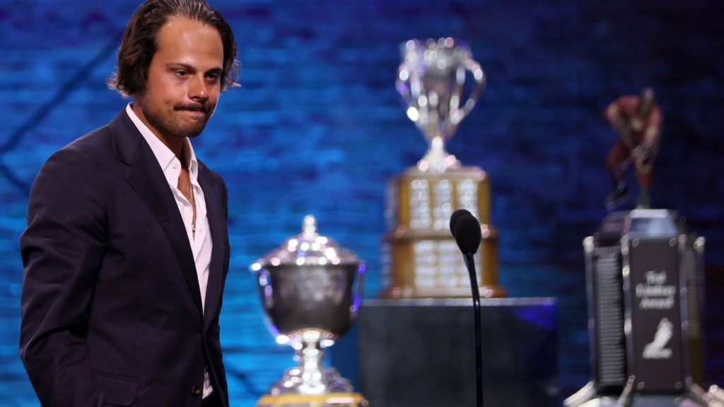 Toronto Maple Leafs forward Auston Matthews receives the Hart Trophy and Ted Lindsey award