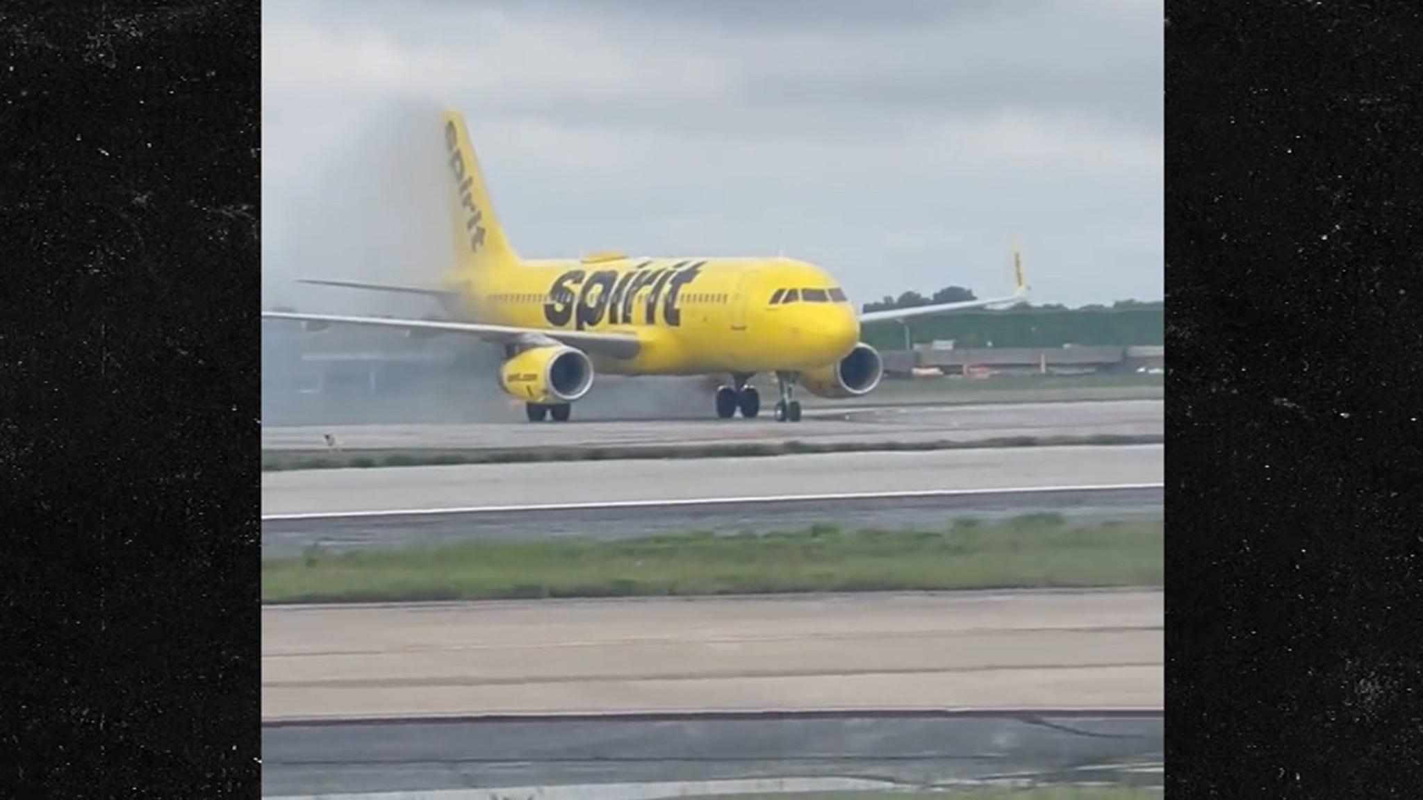 The frame of a Spirit Airlines plane caught fire, and passengers were told to 'stay seated'