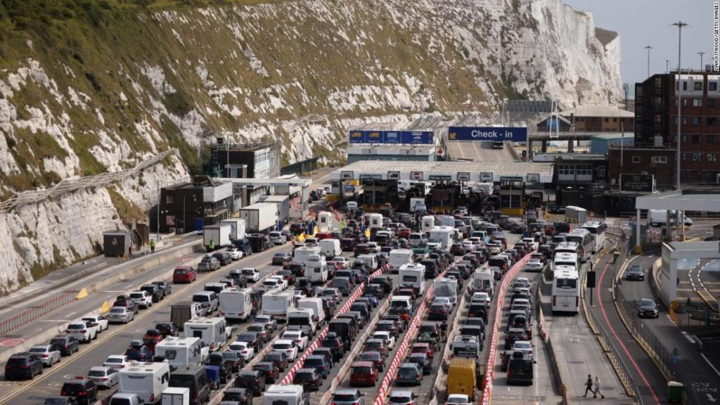 Brexit is blamed for delays as British truck drivers and travelers face a deadlock in Dover