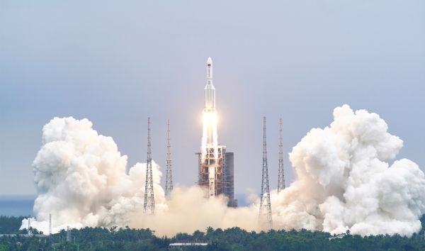 A Long March 5B rocket launches Tianhe, the core module of China