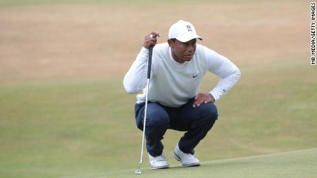 Woods prepares for a shot during his second round in the 150th Open at St Andrews.