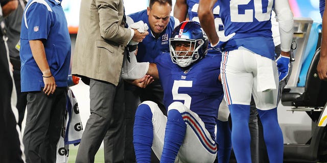 5 of the New York Giants, Kayvon Thibodeaux, stands after an apparent injury during the first half of a pre-season game against the Cincinnati Bengals at MetLife Stadium on August 21, 2022 in East Rutherford, New Jersey. 