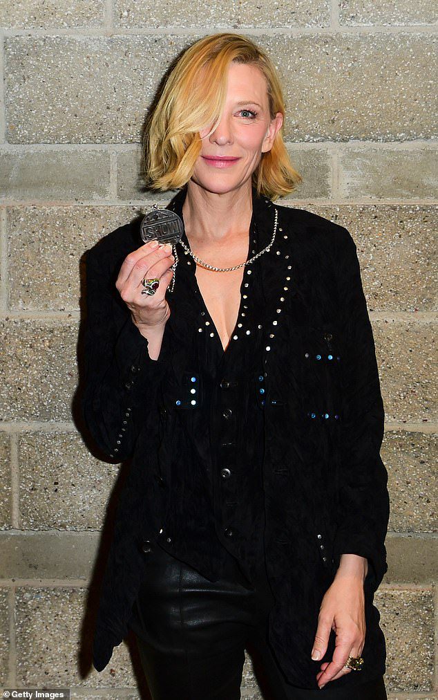 Fabulous!  The 53-year-old actress cut a chic figure in a black jacket featuring gorgeous silver rivets, which she paired with skinny leather pants.