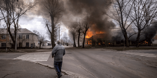 A man walks on a street in Severodonetsk, eastern Ukraine, after a bombing 