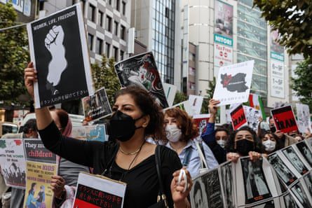 Demonstrators against the Commission for the Promotion of Virtue and the Prevention of Vice march in the Shibuya district of Tokyo, Japan, on Saturday.