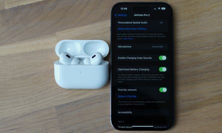 AirPods Pro next to the iPhone displays the Settings pane.