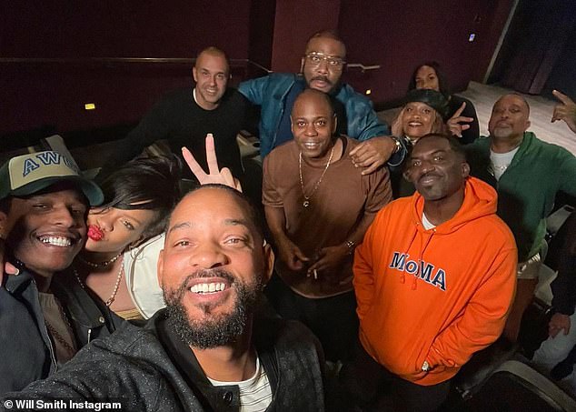 Forgive everything?  Dave Chappelle (centre) supported Will Smith's comeback after being slapped at the Oscars - less than two months after he was described as a