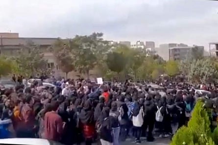 An image capture from a user-generated video on Twitter taken on Saturday, October 22, shows students protesting outside Tabriz University of Medical Sciences.