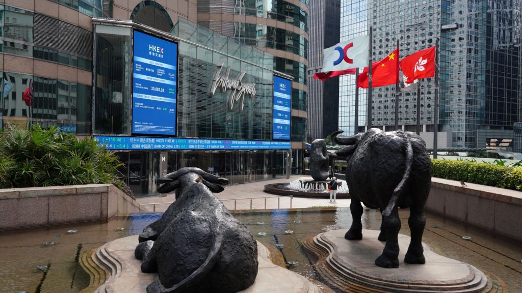 Hong Kong shares jump after China reduces quarantine period, up more than 7%