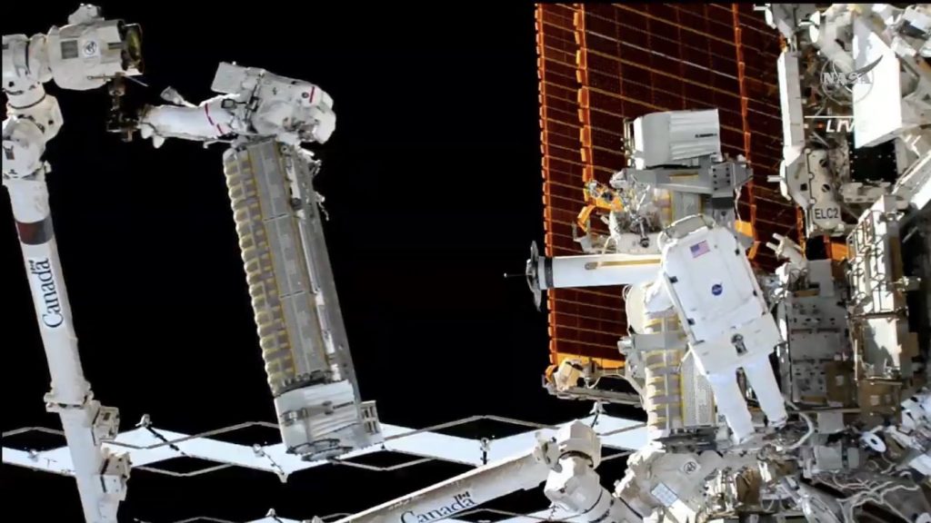 Astronauts install a new solar array outside the International Space Station - Spaceflight Now