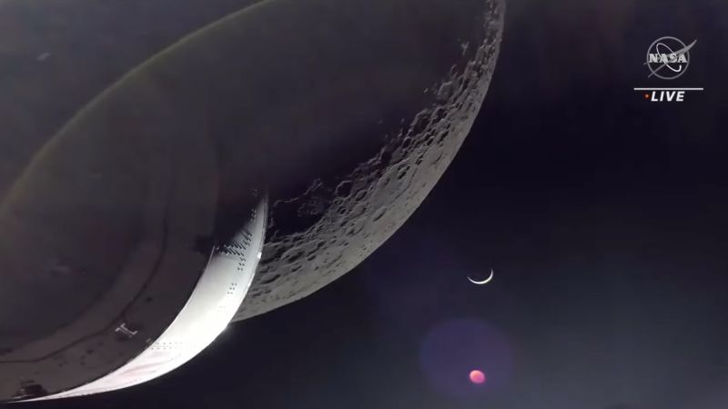 NASA’s Orion capsule flies by the moon