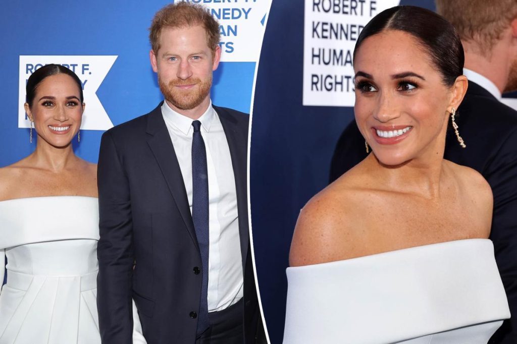 Prince Harry and Meghan Markle receiving the 2022 Ripple of Hope Award